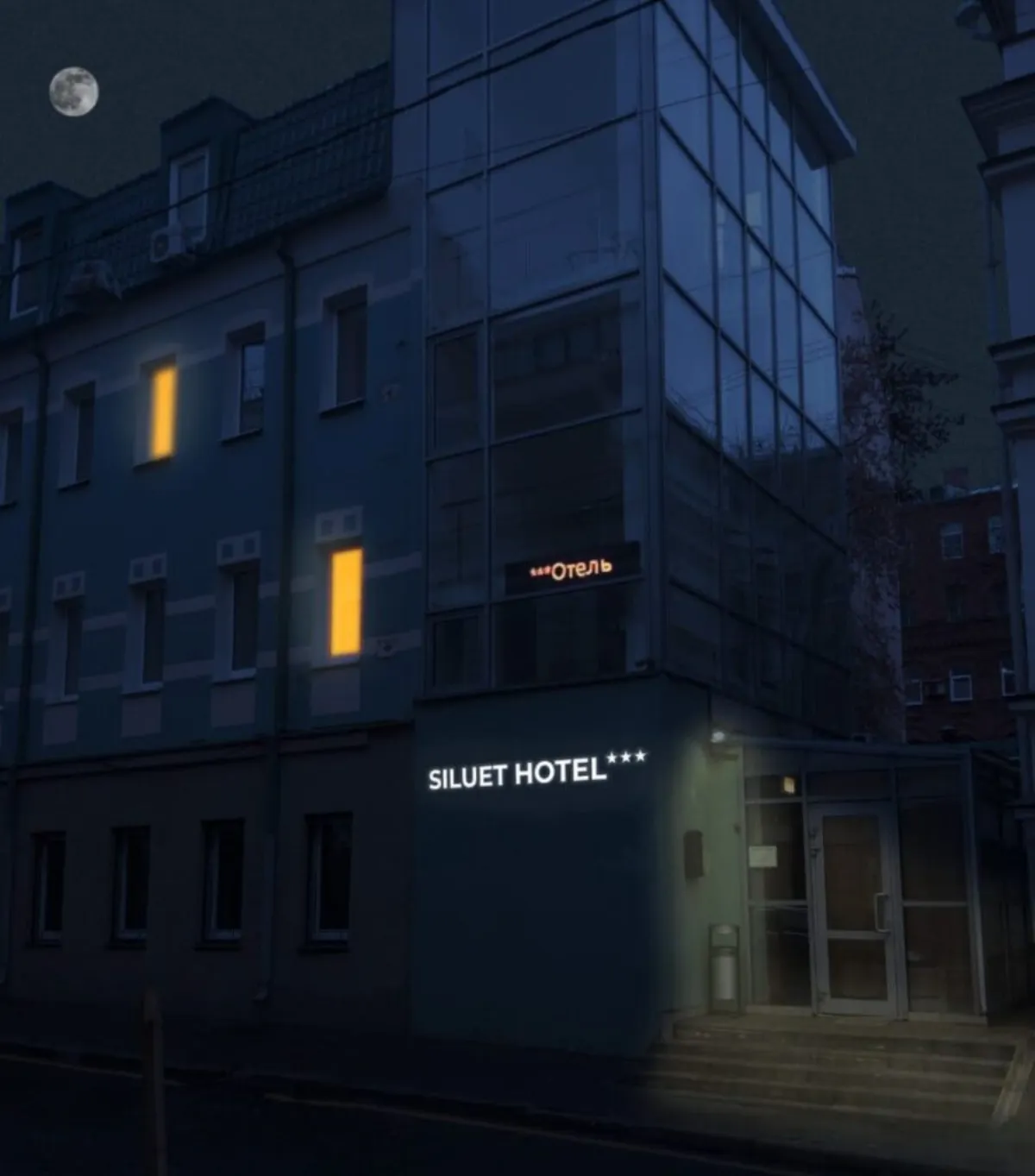 Ночной фасад отеля Силуэт с вывеской SILUET HOTEL